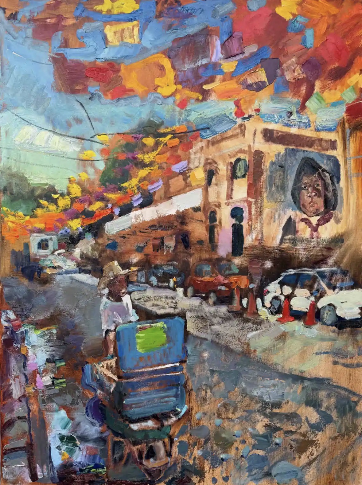 Street scene with colorful sky, buildings, cars, and a person pushing a cart, painted in an impressionistic style.