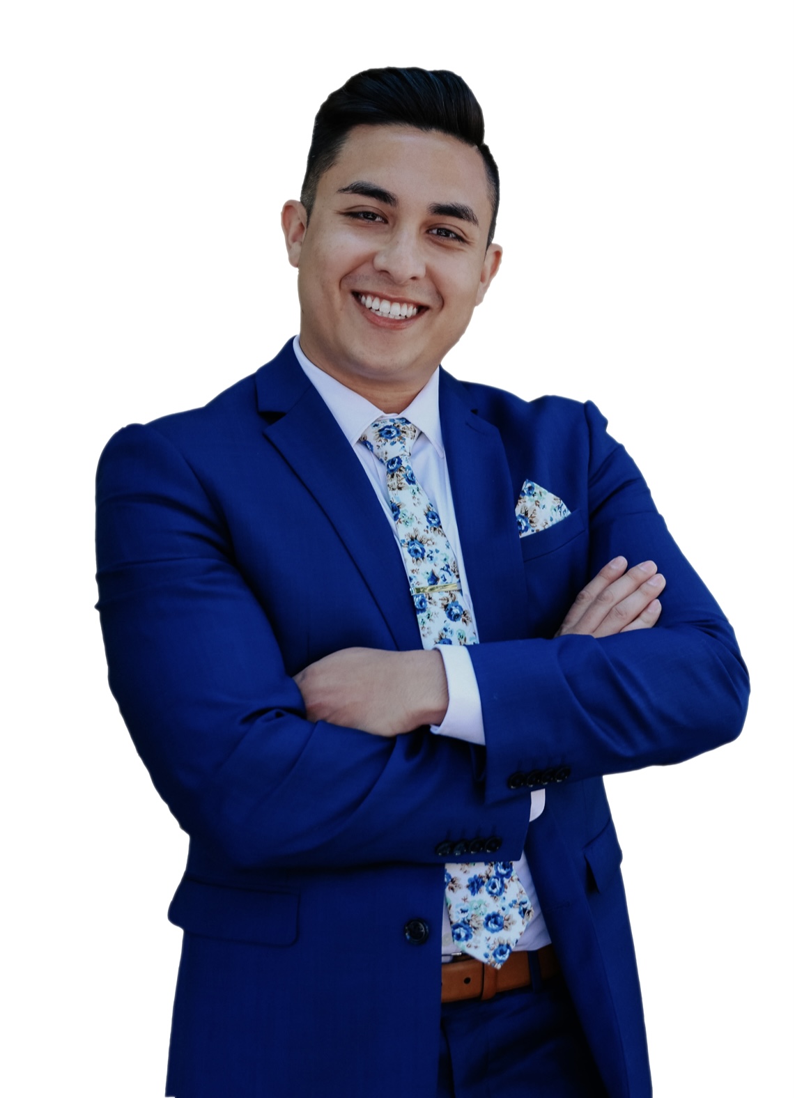 Young man in a blue suit smiling with arms crossed, white background.