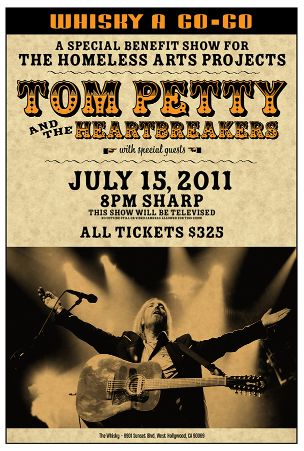Concert ticket for Tom Petty and Heartbreakers show on July 15, 2011, at 8 PM, with a person playing guitar on stage.